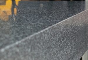 Granite CNC base maintains thermal stability and dimensional precision