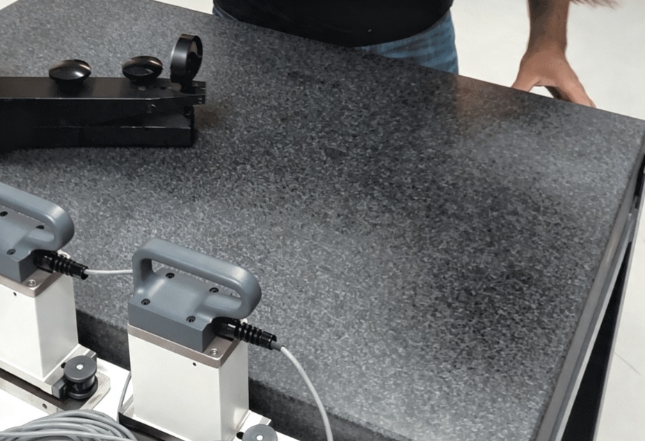 Custom granite CMM plate with precision metrology features