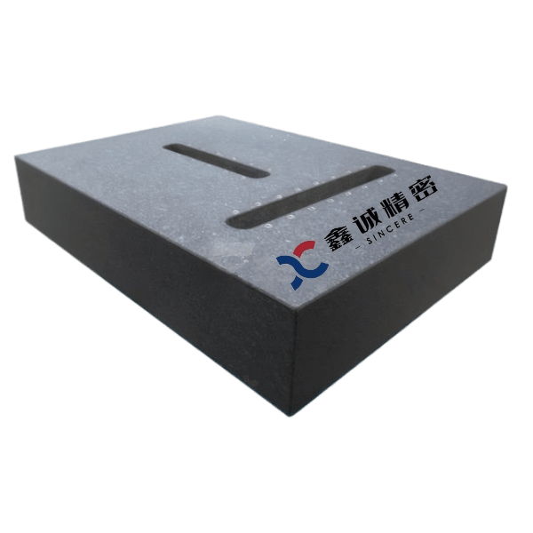 Black granite inspection platform with two machined mounting slots